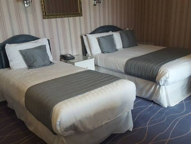 Imagen de la habitación del Hotel The Devoncourt Resort. Foto 15