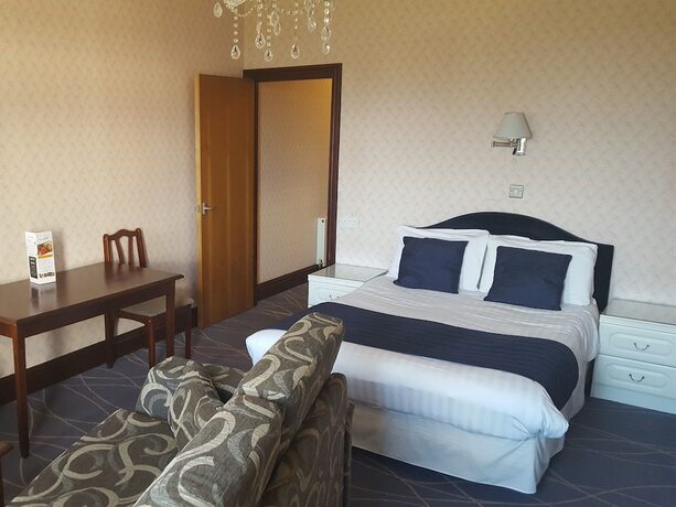Imagen de la habitación del Hotel The Devoncourt Resort. Foto 16