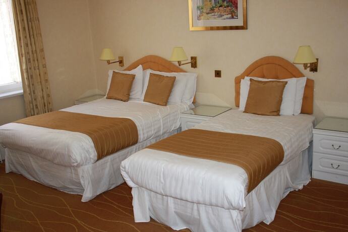 Imagen de la habitación del Hotel The Devoncourt Resort. Foto 17