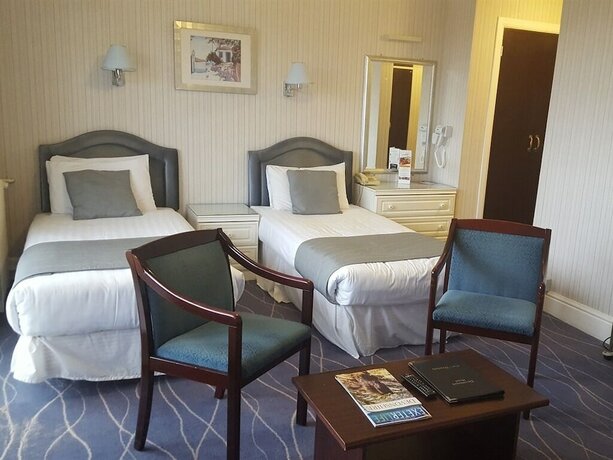 Imagen de la habitación del Hotel The Devoncourt Resort. Foto 18