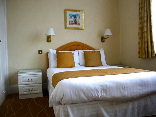 Imagen de la habitación del Hotel The Devoncourt Resort. Foto 20