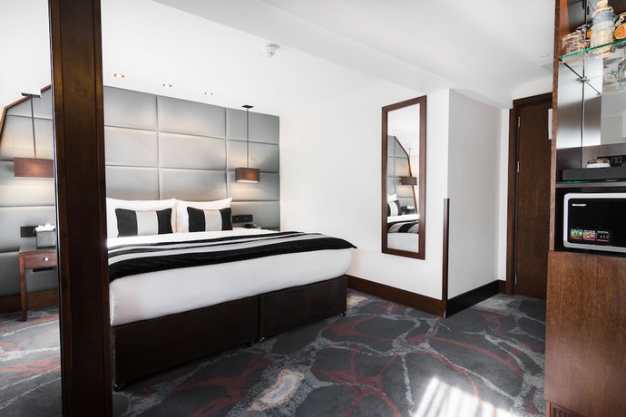 Imagen de la habitación del Hotel The Devonshire. Foto 15