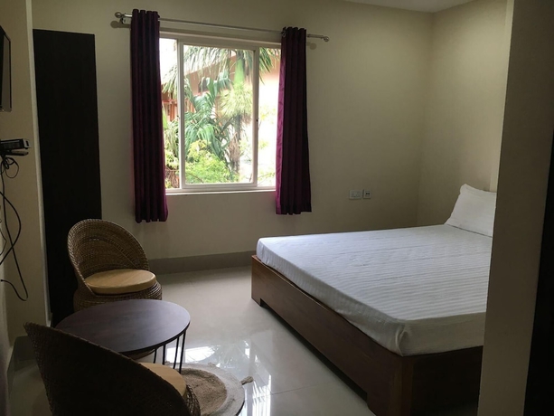 Imagen de la habitación del Hotel The Dew Drop. Foto 11