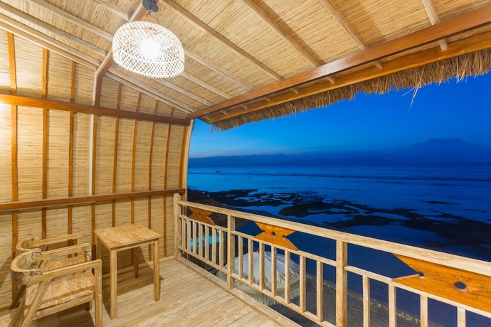 Imagen de la habitación del Hotel The Dewi Premier. Foto 6