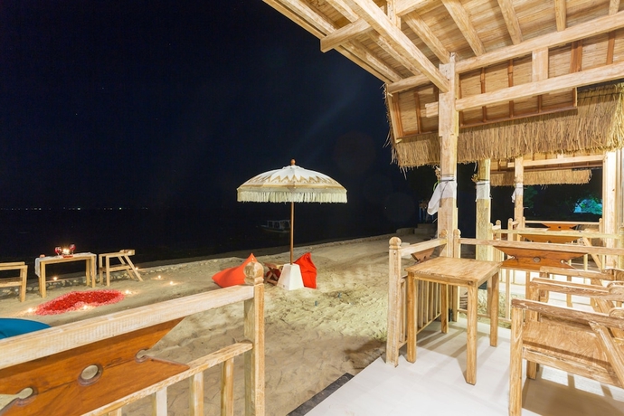 Imagen de la habitación del Hotel The Dewi Premier. Foto 8