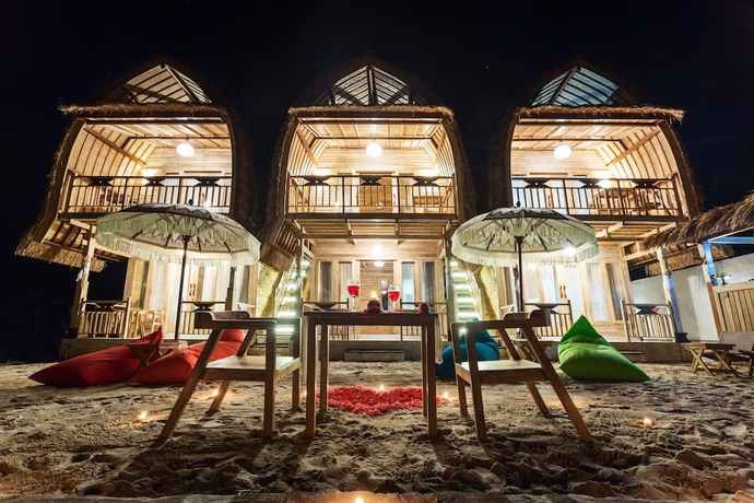 Imagen de la habitación del Hotel The Dewi Premier. Foto 14