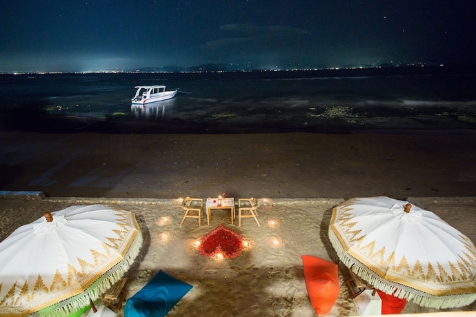 Imagen de la habitación del Hotel The Dewi Premier. Foto 16