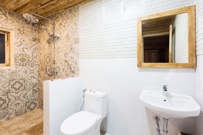 Imagen de la habitación del Hotel The Dewi Premier. Foto 18