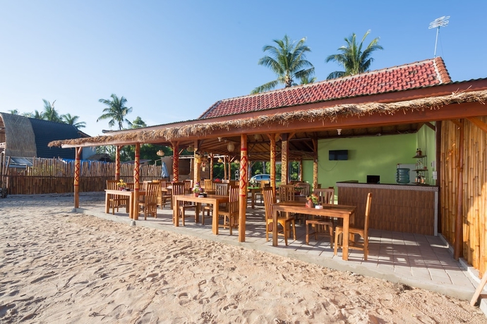 Imagen del bar/restaurante del Hotel The Dewi Premier. Foto 4