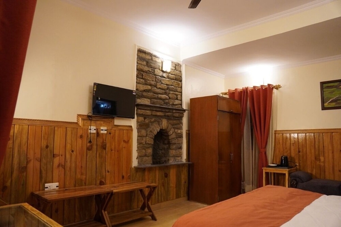 Imagen de la habitación del Hotel The Dharmas Resort. Foto 1