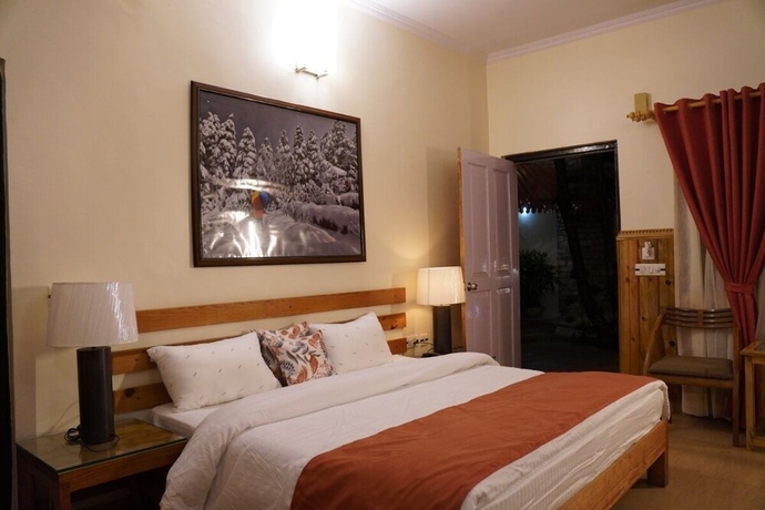 Imagen de la habitación del Hotel The Dharmas Resort. Foto 5