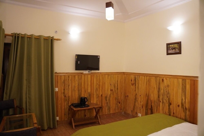 Imagen de la habitación del Hotel The Dharmas Resort. Foto 7