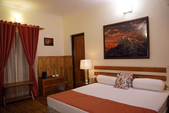 Imagen de la habitación del Hotel The Dharmas Resort. Foto 11