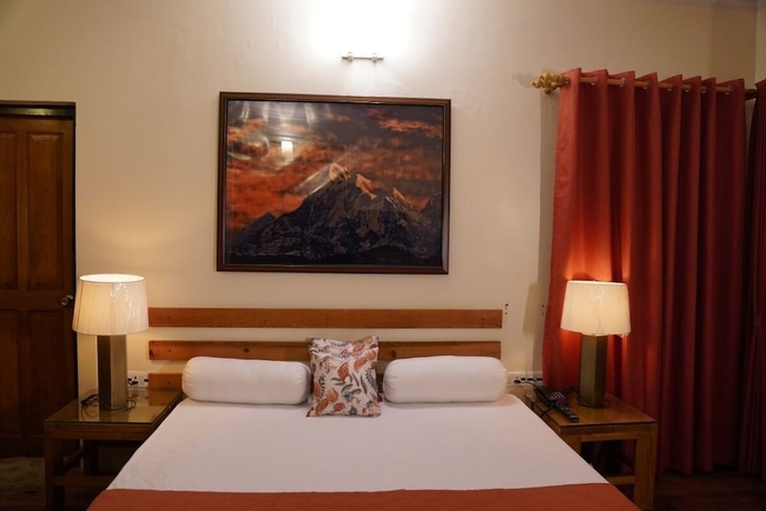 Imagen de la habitación del Hotel The Dharmas Resort. Foto 12
