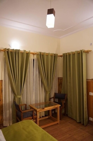 Imagen de la habitación del Hotel The Dharmas Resort. Foto 15