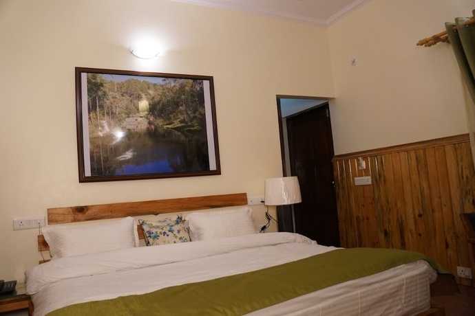 Imagen de la habitación del Hotel The Dharmas Resort. Foto 16