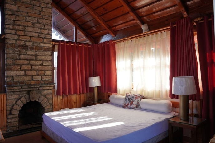 Imagen de la habitación del Hotel The Dharmas Resort. Foto 18