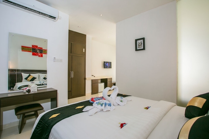 Imagen de la habitación del Hotel The Diana Suite Tuban. Foto 8