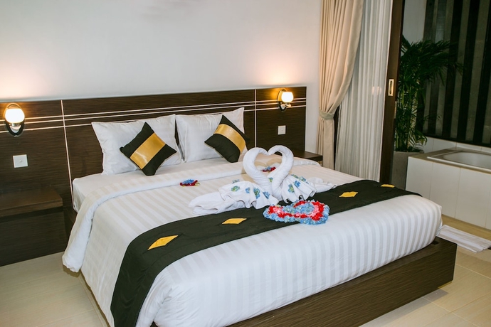 Imagen de la habitación del Hotel The Diana Suite Tuban. Foto 10