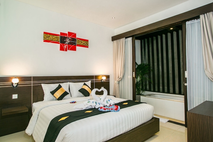 Imagen de la habitación del Hotel The Diana Suite Tuban. Foto 11