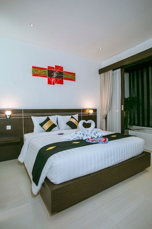 Imagen de la habitación del Hotel The Diana Suite Tuban. Foto 14