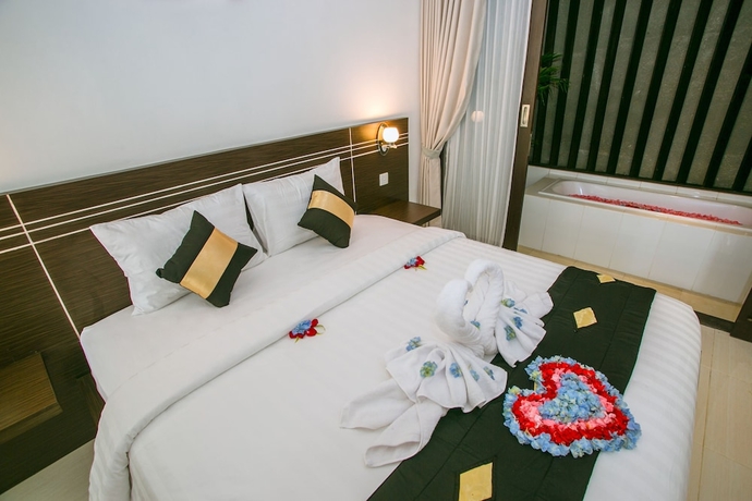 Imagen de la habitación del Hotel The Diana Suite Tuban. Foto 15