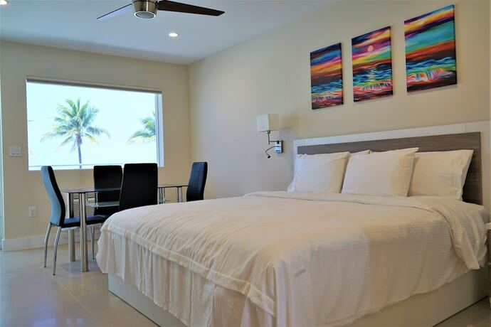 Imagen de la habitación del Hotel The Diane Oceanfront Suites. Foto 20