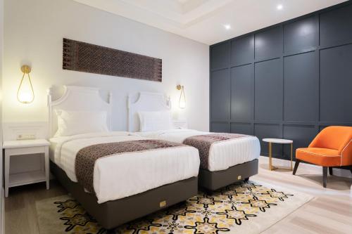 Imagen de la habitación del Hotel The Difan. Foto 18