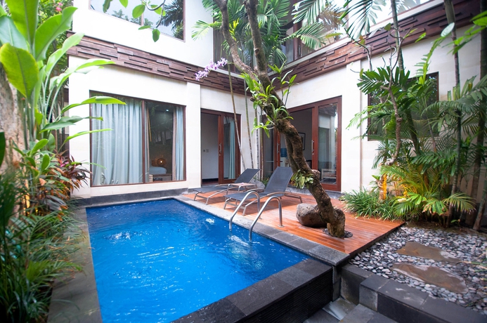 Imagen de la piscina del Hotel The Dipan Resort Petitenget. Foto 14