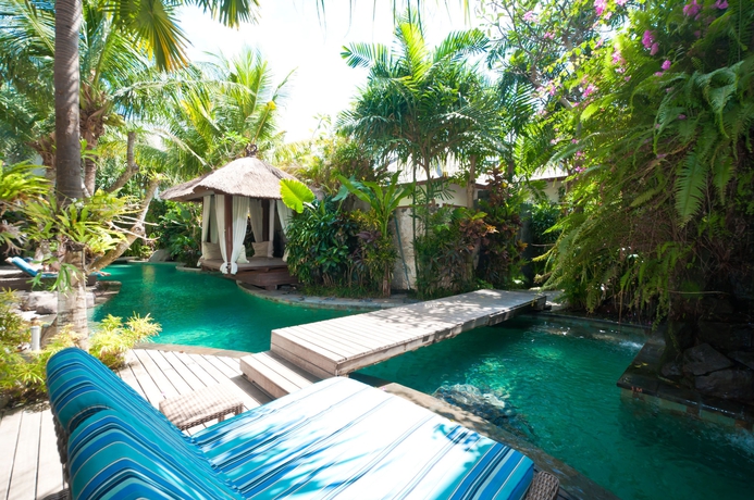 Imagen de la piscina del Hotel The Dipan Resort Petitenget. Foto 15