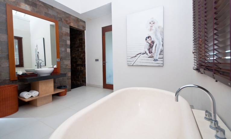 Imagen de la habitación del Hotel The Dipan Resort Petitenget. Foto 10