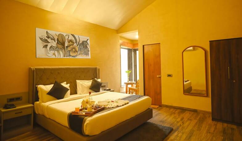 Imagen de la habitación del Hotel The Divine Hills Resort Udaipur. Foto 11