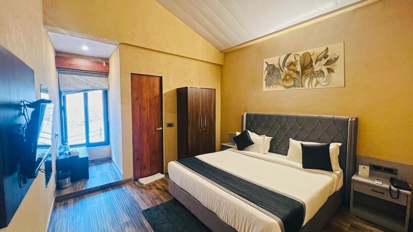 Imagen de la habitación del Hotel The Divine Hills Resort Udaipur. Foto 12