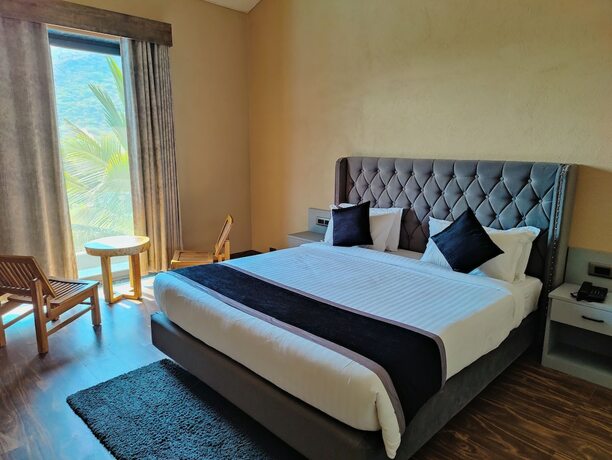 Imagen de la habitación del Hotel The Divine Hills Resort Udaipur. Foto 14