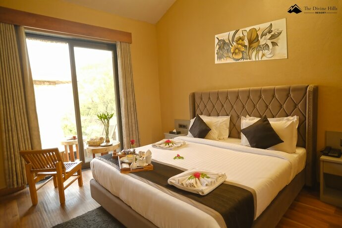 Imagen de la habitación del Hotel The Divine Hills Resort Udaipur. Foto 17