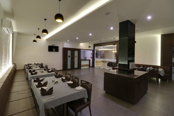 Imagen general del Hotel The Divine Resort, Veraval. Foto 11