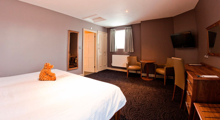 Imagen del bar/restaurante del Hotel The Dog and Doublet Inn. Foto 6