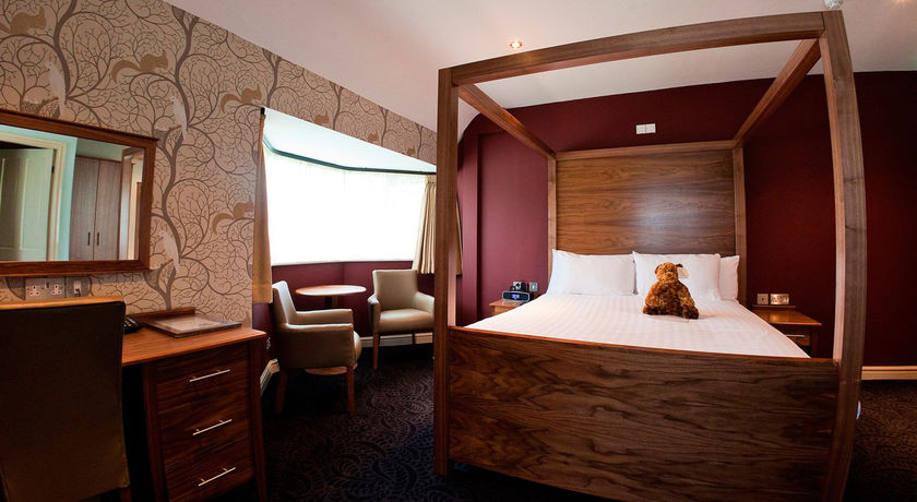 Imagen de la habitación del Hotel The Dog and Doublet Inn. Foto 12