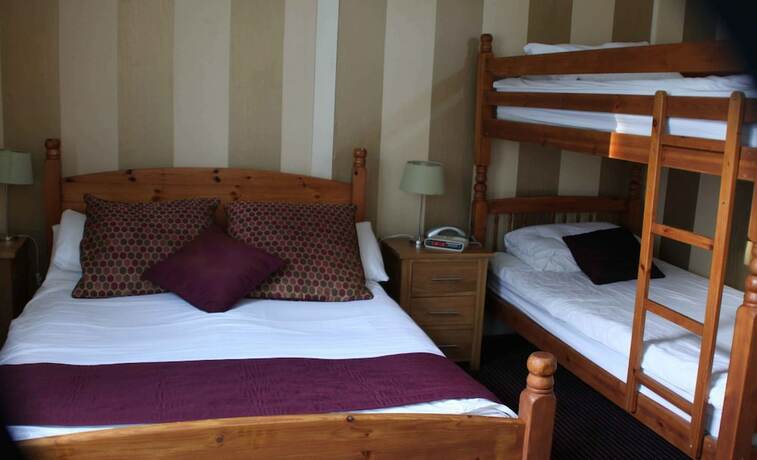 Imagen de la habitación del Hotel The Dog and Partridge Country Inn. Foto 12