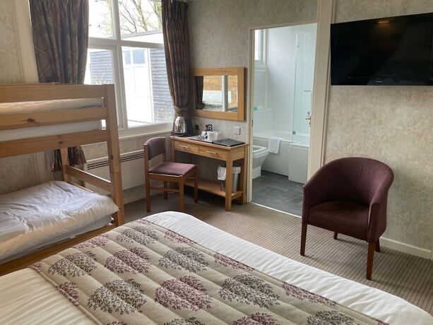 Imagen de la habitación del Hotel The Dog and Partridge Country Inn. Foto 19