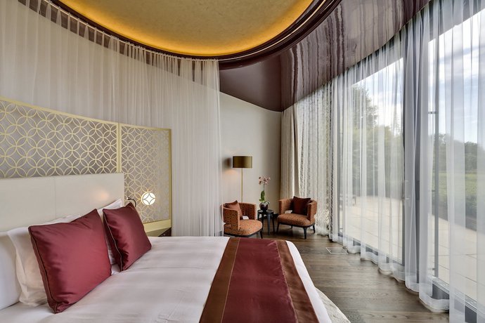 Imagen de la habitación del Hotel The Dolder Grand. Foto 12