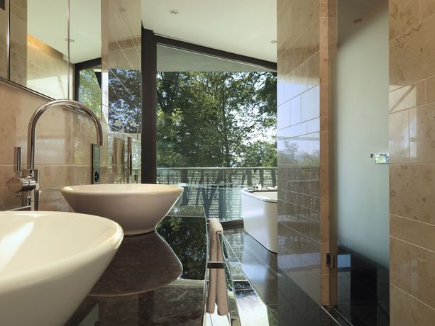 Imagen de la habitación del Hotel The Dolder Grand. Foto 13