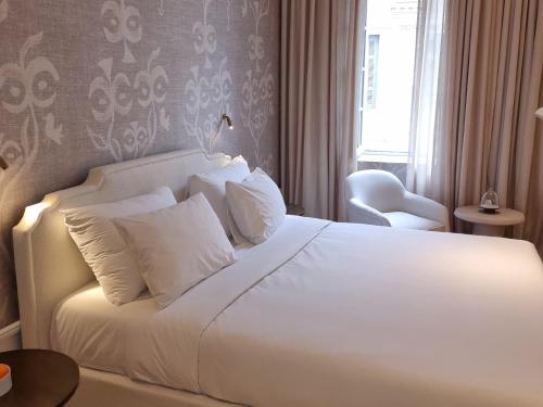 Imagen de la habitación del Hotel The Dolli At Acropolis. Foto 3