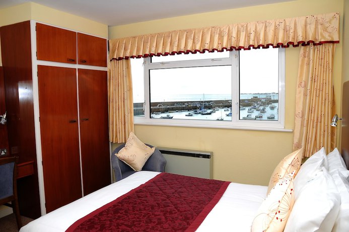 Imagen de la habitación del Hotel The Dolphin. Foto 15