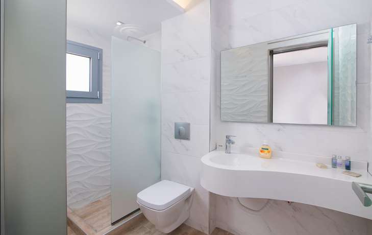 Imagen de la habitación del Hotel The Dome Luxury Thassos. Foto 2