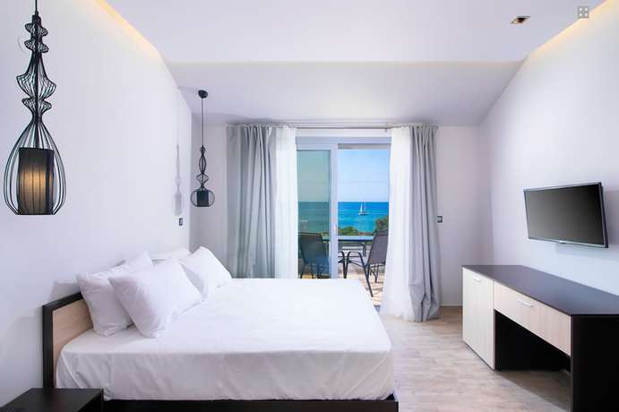 Imagen de la habitación del Hotel The Dome Luxury Thassos. Foto 5
