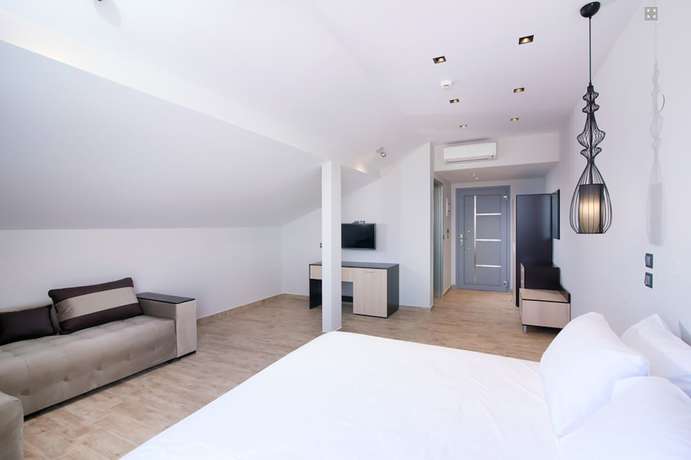 Imagen de la habitación del Hotel The Dome Luxury Thassos. Foto 13