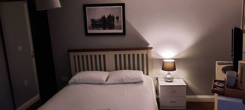 Imagen de la habitación del Hotel The Dorrington. Foto 5