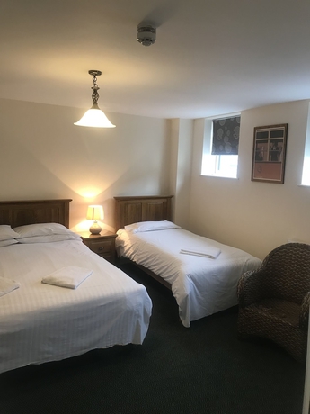 Imagen de la habitación del Hotel The Dorrington. Foto 6