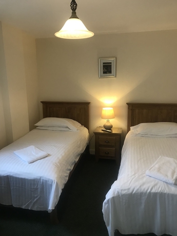 Imagen de la habitación del Hotel The Dorrington. Foto 10